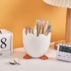 Creative cartoon student pen holder, office hatchback chicken storage box, cute multi-functional makeup brush, desktop storage bucket Application Scenario